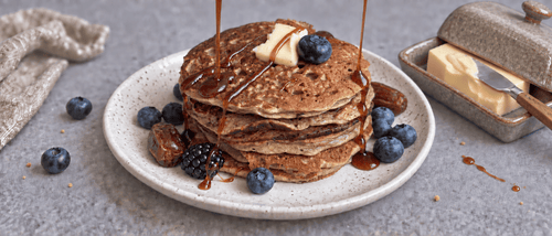 banana pancake with date syrup drizzle on top